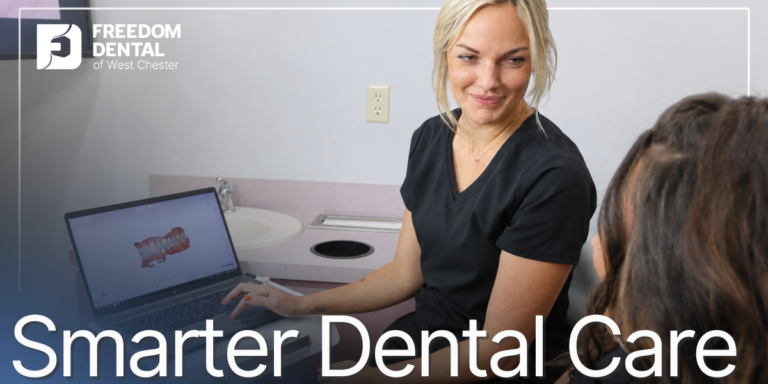 Smarter Dental Care dental assistant showing digital scans to patient