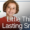 child holding toothbrush and smiling