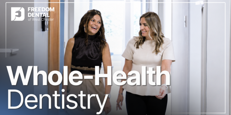 Whole-Health Dentistry patient walking with doctor and smiling